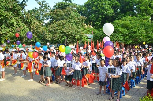 Sáng nay 5/9, hơn 20 triệu học sinh trên cả nước đồng loạt tham gia vào ngày lễ khai giảng bắt đầu năm học mới. Ảnh Tiền Phong