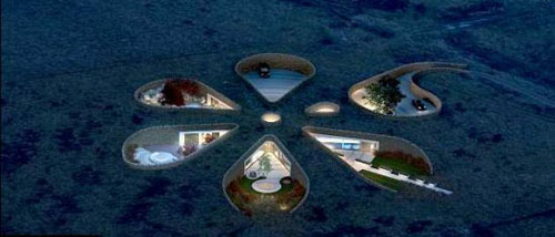 Ngôi nhà của Gary Neville nằm gọn trong lòng một quả đồi. 5 phần không gian mở phục vụ sinh hoạt tạo nên 5 cánh hoa, trong khi con đường vào nhà trông như một cái cuống