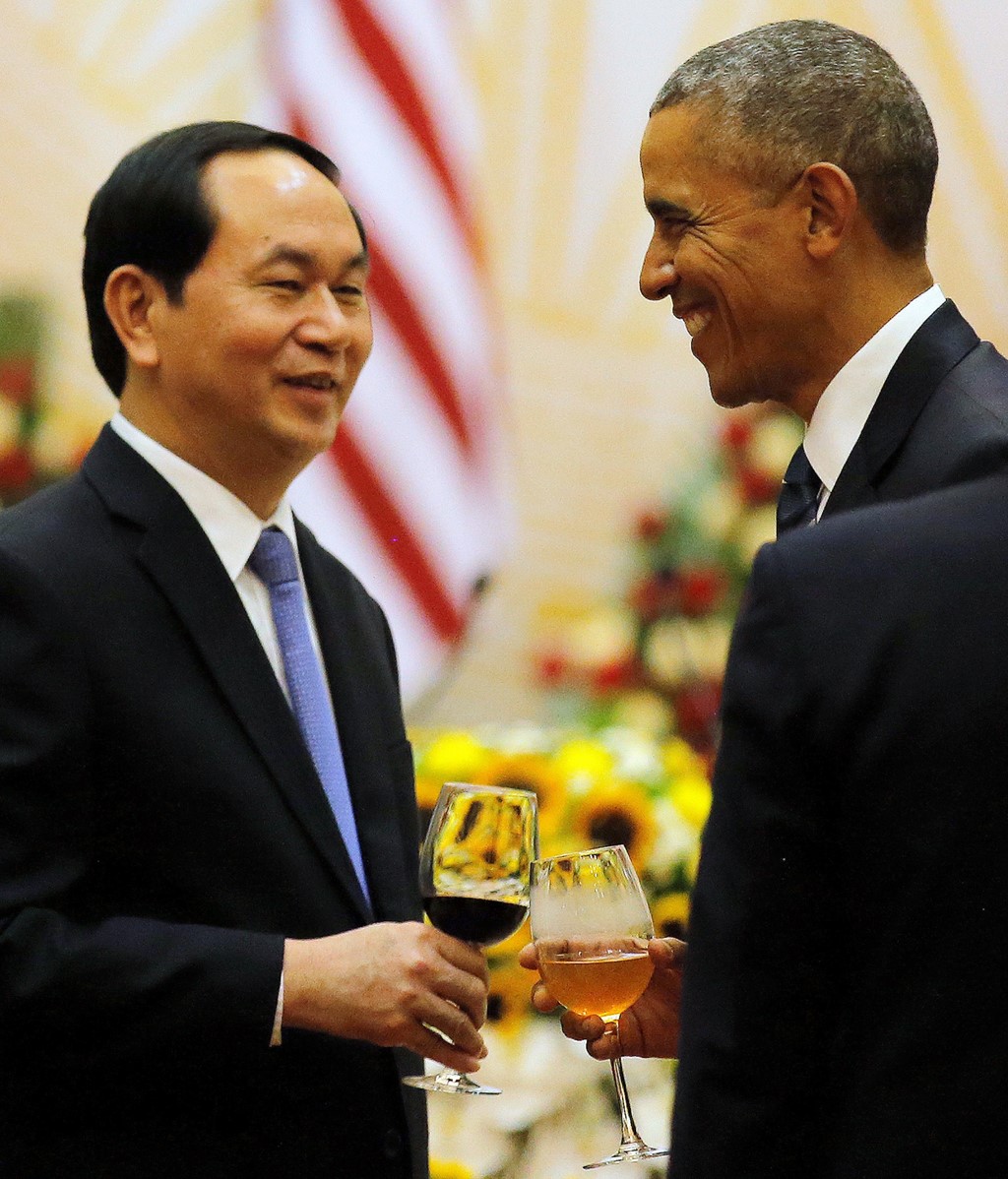  Sau đó, Tổng thống Obama dự tiệc chiêu đãi cùng với Chủ tịch nước Trần Đại Quang. Ảnh: Reuters