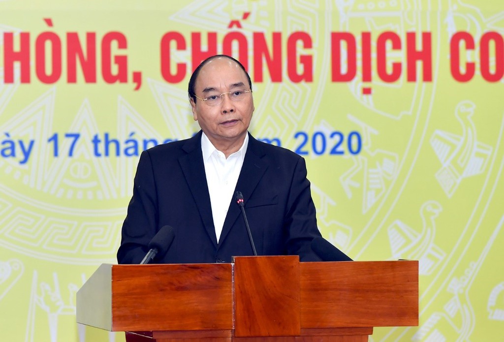 Thủ tướng Chính phủ Nguyễn Xuân Phúc nhấn mạnh: “Việt Nam đang đứng trước những thời khắc quan trọng, đang phải đối mặt với đại dịch Covid-19 ở quy mô toàn cầu''. Ảnh: Ngân hàng Nhà nước