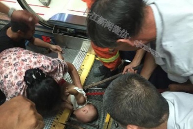 Một cô gái Trung Quốc bị thang máy kẹt đứt đầu