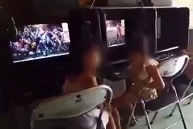 Bức xúc clip bé gái 8 tuổi ngồi hút thuốc trong quán game, người lớn tỏ ra thích thú