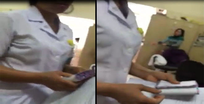 Tạm đình chỉ nữ cán bộ y tế cầm một xấp phong bì tại Bệnh viện K