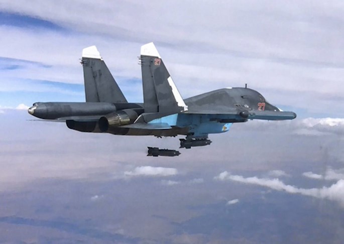 Tiêm kích Su-34 thả bom thông minh KAB-500-S xuống mục tiêu ở Syria