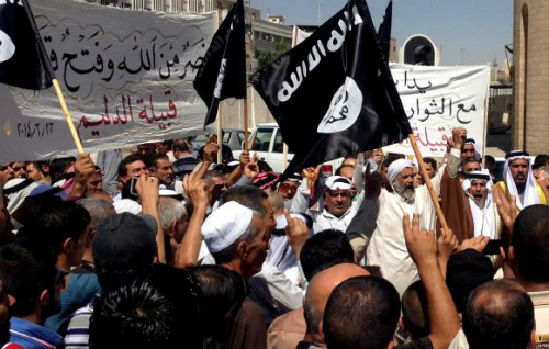 Những người ủng hộ khủng bố IS diễu hành trên đường phố Mosul hồi tháng 6
