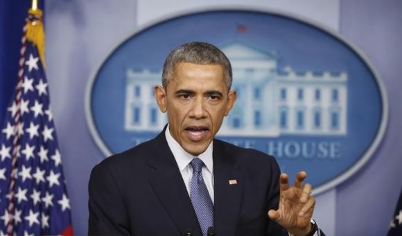 Tổng thống Mỹ Barack Obama trả lời câu hỏi của phóng viên về cuộc tấn công vào hãng Sony trong buổi họp báo tại Nhà Trắng, hôm 19/12/2014.