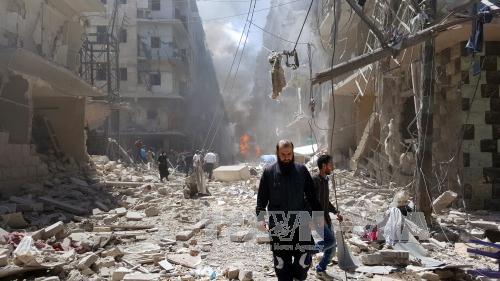 Cảnh đổ nát trong xung đột ở Aleppo ngày 28/4. Ảnh: EPA/TTXVN