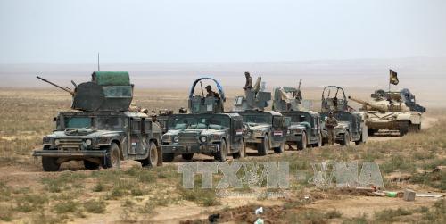  Chiến sự Syria hôm nay đề cập đến vấn đề Iraq cắt các tuyến tiếp viện IS từ Mosul tới Syria. Ảnh: AFP/TTXVN