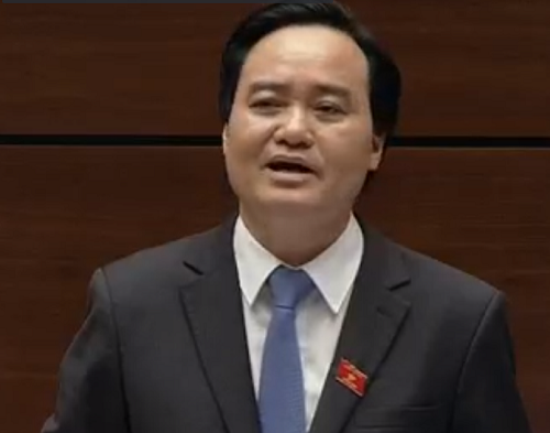  Bộ trưởng Phùng Xuân Nhạ trả lời chất vấn Quốc hội. Ảnh chụp màn hình