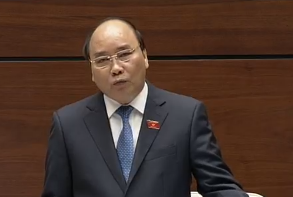 Thủ tướng Chính phủ Nguyễn Xuân Phúc trả lời chất vấn của đại biểu quốc hội. Ảnh chụp màn hình