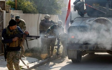  Khủng bố IS: Binh sĩ Iraq đang chiếm ưu thế tại Mosul. Ảnh: Reuters