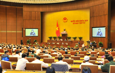  Bộ trưởng Đinh Tiến Dũng trả lời chất vấn Quốc hội sáng ngày 16/11. Ảnh: VGP