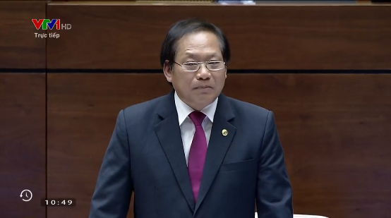  Bộ trưởng Trương Minh Tuấn trả lời chất vấn trước Quốc hội. Ảnh chụp màn hình