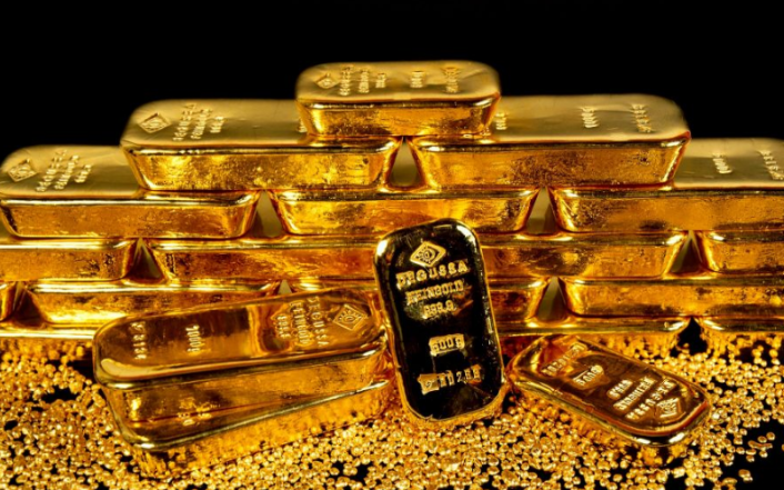 Giá vàng đang chịu áp lực giảm từ đà tăng của đồng USD và sự hồi phục của thị trường chứng khoán