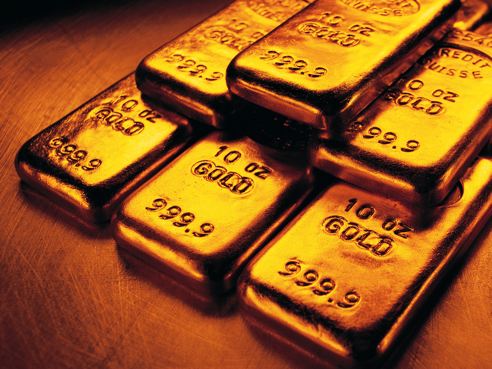 Giới chuyên gia dự đoán giá vàng thế giới khó trụ ở mốc 1.330 USD/ounce