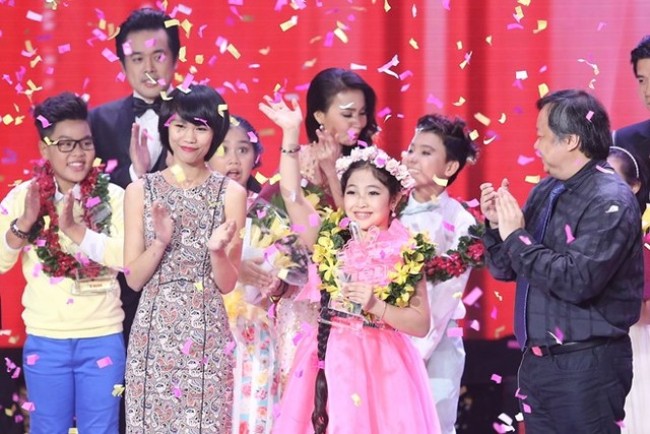 ‘Công chúa tóc mây’ Trịnh Nguyễn Hồng Minh đã trở thành quán quân Giọng hát Việt nhí 2015