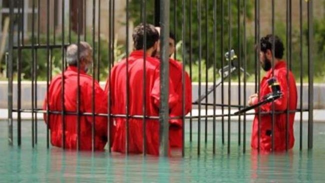 Các tù nhân bị khủng bố IS nhúng vào bể chứa axit nitric độc hại