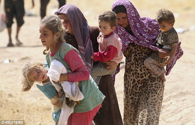 Phụ nữ và trẻ em Yazidi phải đối mặt với nguy cơ bị IS bắt cóc và bán làm nô lệ tình dục