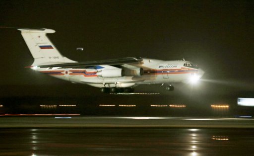 Máy bay Nga chở các thi thể nạn nhân hạ cánh xuống sân bay Pulkovo ở ngoại o St.Petersburg (Ảnh: AP)