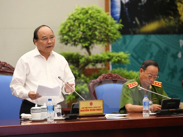 Phó Thủ tướng Nguyễn Xuân Phúc, Trưởng Ban Chỉ đạo 138/CP phát biểu tại hội nghị. (Ảnh: Doãn Tấn/TTXVN)