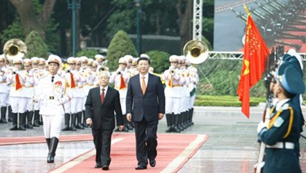 Tổng Bí thư Ban Chấp hành Trung ương Đảng Cộng sản Việt Nam Nguyễn Phú Trọng và Tổng Bí thư, Chủ tịch Trung Quốc Tập Cận Bình. 