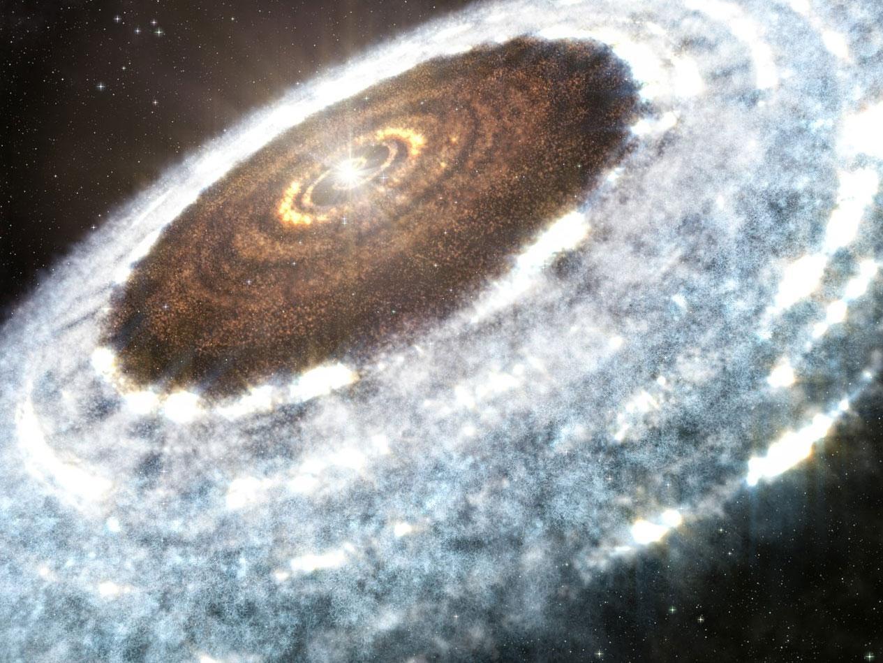 Tin khoa học cho thấy bằng chứng cho thấy sợi tuyết xung quanh ngôi sao V883 Orionis. Ảnh NRAO/AUI/NSF