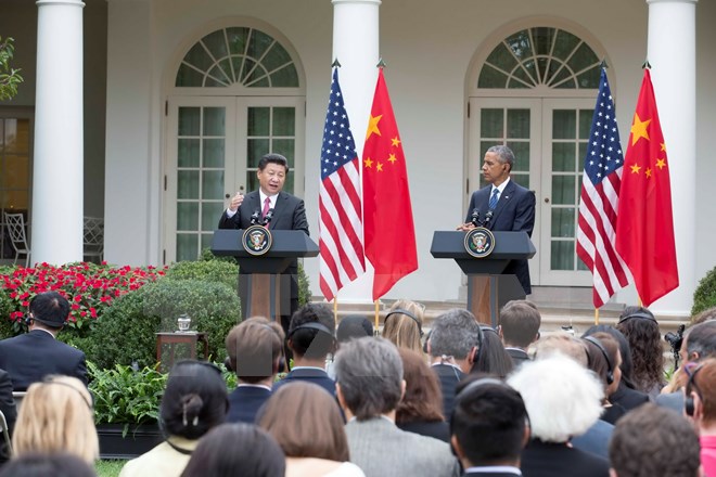 Tổng thống Mỹ Barack Obama (phải) và Chủ tịch Trung Quốc Tập Cận Bình (trái) tại cuộc họp báo chung ở Nhà Trắng, theo tin tức mới cập nhật quốc tế 