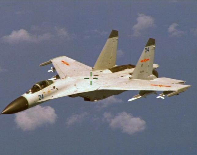 Chiến đấu cơ J-11 của Trung Quốc từng áp sát máy bay P-8 Poisedon của Mỹ ở Biển Đông tháng 8/2014