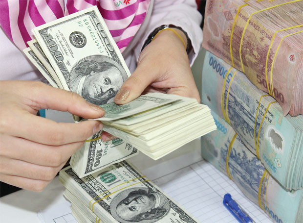 Ngân hàng nhà nước niêm yết tỷ giá sáng nay (21/04) là 1 USD = 21.458 đồng Việt Nam