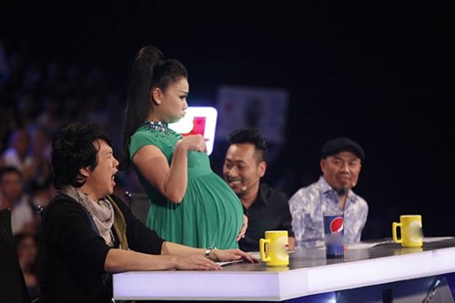 Thu Minh cho biết cô muốn truyền cảm hứng cho các bà bầu khác thông qua việc nhận lời làm giám khảo Vietnam Idol 2015
