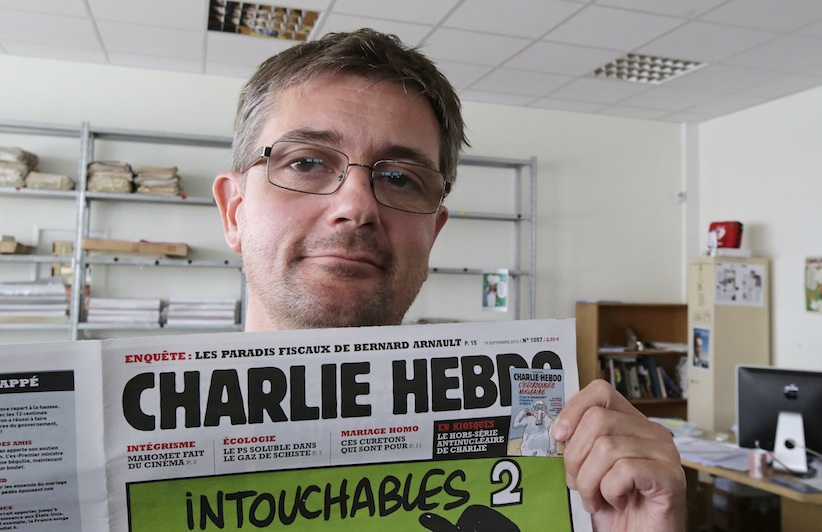 Tổng biên tập tờ báo - ông Stephane Charbonnier - đã thiệt mạng trong vụ xả súng