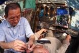 Cắt tóc vỉa hè: Coi chừng nhiễm HIV