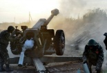 Ukraine ‘chân trước’ hòa hoãn với quân ly khai, ‘chân sau’ tấn công Donetsk