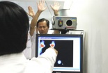 Đo thân nhiệt với hành khách tại sân bay Nội Bài phòng vi rút gây teo não