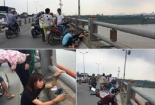 Người vợ trẻ khóc ngất chứng kiến cảnh chồng nhảy cầu tự tử