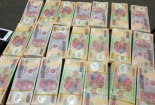Phát hiện triệt phá đường dây bán tiền giả giống đến 80% tiền thật