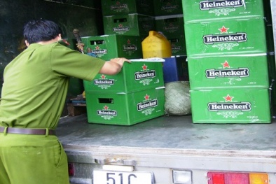 Triệt phá đường dây làm giả bia Heineken