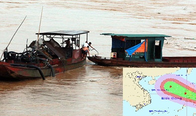 Bão Rammasun sắp đổ bộ, nước lũ sông Hồng bất ngờ dâng cao