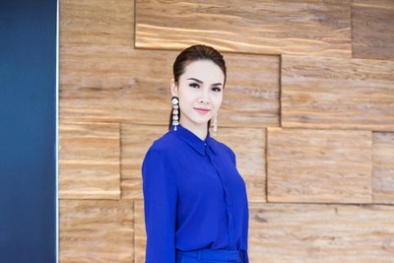 Ngắm Yến Trang trẻ trung trong trang phục xanh kín đáo