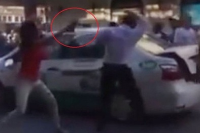 Lái xe taxi bị 3 cô gái quây đánh giữa phố vì va chạm