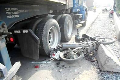 Tp.HCM: Bà bầu may mắn thoát chết dưới bánh xe container