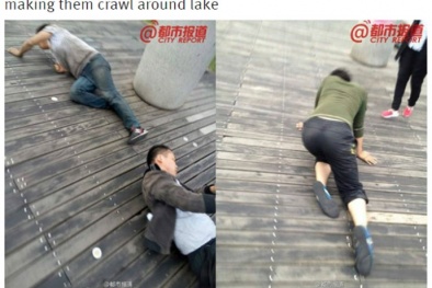 Trung Quốc: Bò quanh hồ nước đến kiệt quệ vì bị sếp phạt