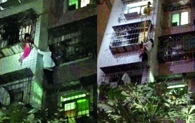 Cô gái dùng tay không leo 5 tầng nhà giải cứu bé gái mắc kẹt