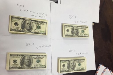Mua 3 bịch đô-la giả từ Campuchia về TP HCM tiêu thụ