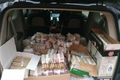 Trung Quốc: 'Vác' hàng trăm cân tiền lẻ đi mua nhà bạc tỷ