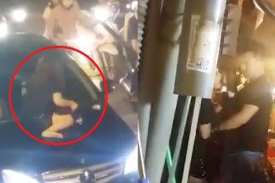 Clip: Cô gái đánh ghen kinh hoàng, đập vỡ kính xe Mercedes giữa phố cổ Hà Nội