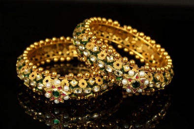 Cập nhật giá vàng trong nước ngày 9/8/2016: Chật vật tăng ngược chiều thế giới